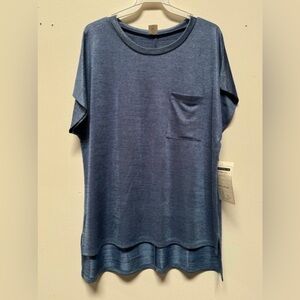 NWOT Sew In Live Top with Slight Shimmer. Color name is denim.